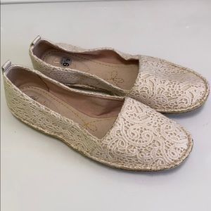 9.5 Clark’s ivory lace slip on shoes